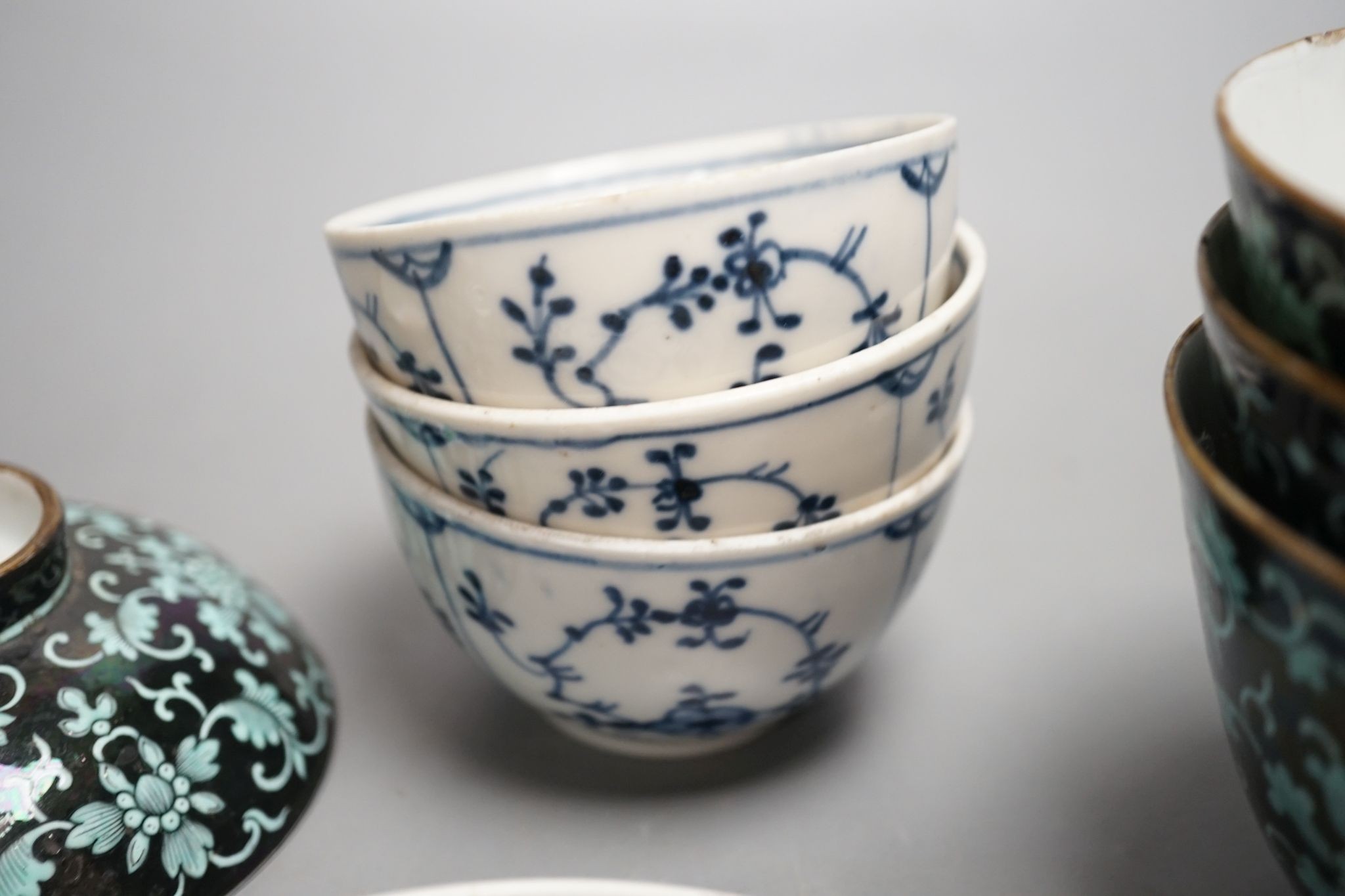 A 19th century Chinese black ground porcelain bowls and two covers, together with an three onion pattern blue and white tea bowls and saucers a/f